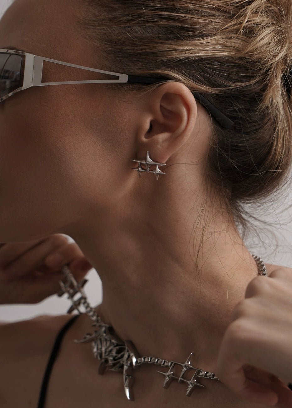 Avant - Garde Star Stud Earrings - Rick Circus