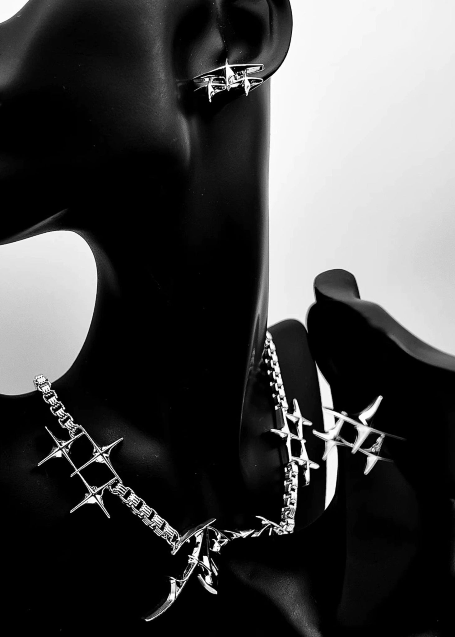 Avant - Garde Star Stud Earrings - Rick Circus