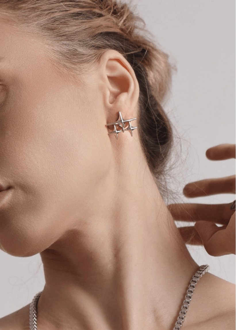 Avant - Garde Star Stud Earrings - Rick Circus