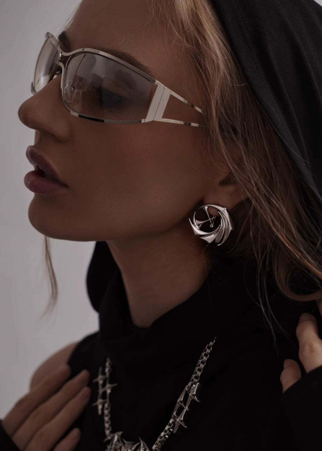 Avant - Garde Winged Swirl Earrings - Rick Circus