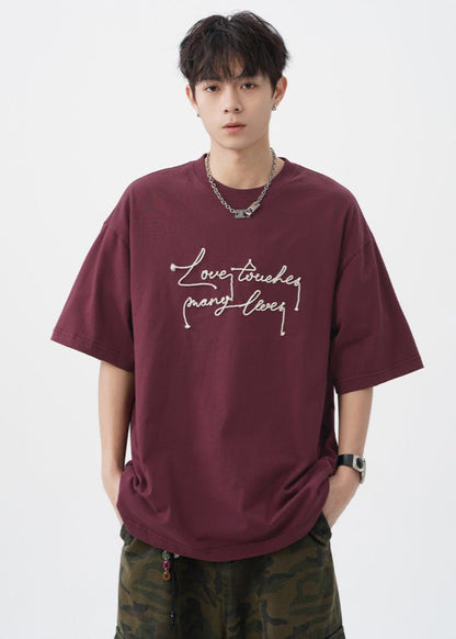 &quot;Love Touches Many Lives&quot; Embroidered Oversized T-Shirt - Rick Circus