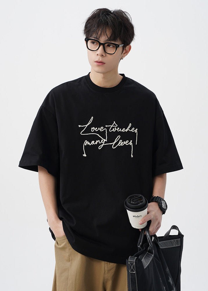 &quot;Love Touches Many Lives&quot; Embroidered Oversized T-Shirt - Rick Circus